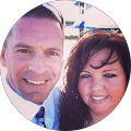 Smiling couple outdoors in sunlight