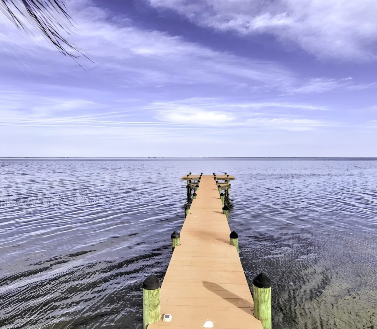 Tranquil pier under a cloudy sky